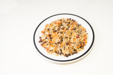 Vegetarian food - plate of rice with  carrots and chickpeas.