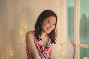 Fototapeta premium Beauty asian woman black hair prepare to celebrate christmas party online with friend.