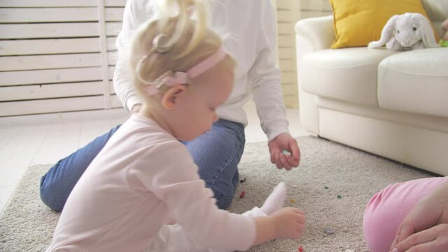 Concept of hearing impairment and their treatment. Cute little girl with a Cochlear implant