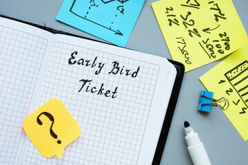 Early Bird Ticket phrase on the piece of paper.