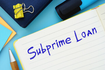 Financial concept about Subprime Loan with inscription on the piece of paper.