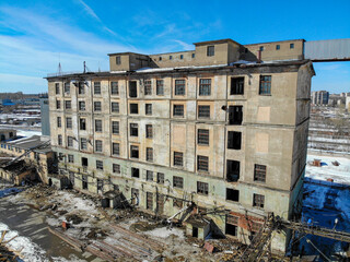 Aerial view of a grain elevator in spring before its demolition (Kirov, Russia)
