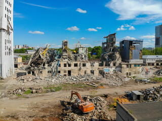 Aerial view of the destruction of a grain elevator by construction equipment (Kirov, Russia)