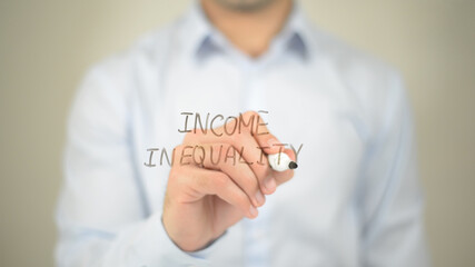 Income Inequality , man writing on transparent screen