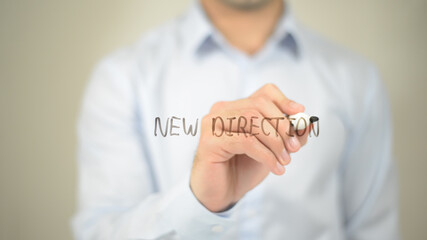 New Direction , man writing on transparent screen