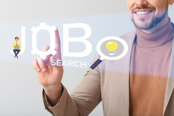 Businessman using job search site against light background