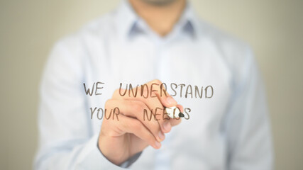 We Understand Your Needs , man writing on transparent screen