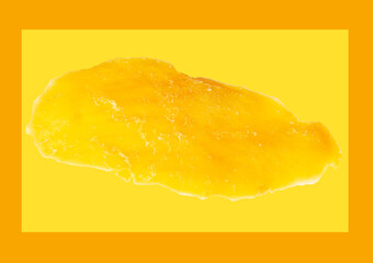 Dried mango isolated on yellow background.