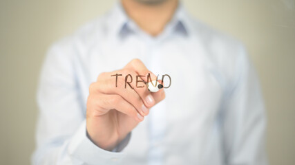 Trend  , man writing on transparent screen