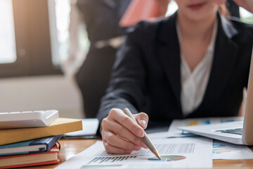 Accountant using a calculator to calculate the numbers. Accounting , Accountancy from financial report and calling to consultant, Calculation Concept.