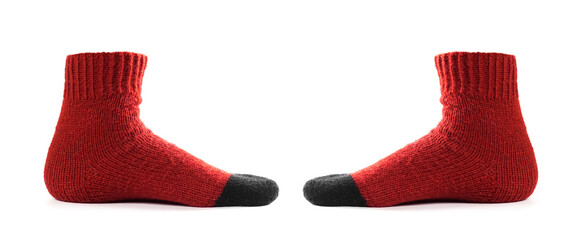 Red socks on the leg. Close up. Isolated on a white background