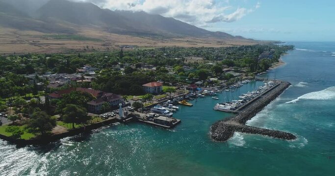 4k stationary hoving aerial drone view of the boat harbor in the city of Lahaina,Maui,Hawaii,USA