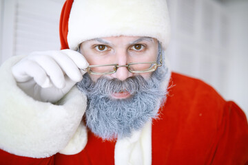Portrait of real happy Santa Claus.Funny Santa. Theme Christmas holidays and winter new year Christmas are coming!