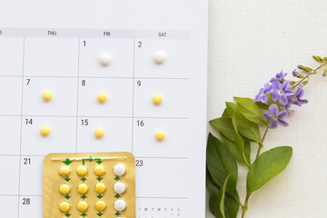 birth control pills of woman not want to have baby with calendar for plan decoration flat lay style on background white 