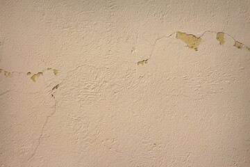 blurred background of an old painted wall in pale colors