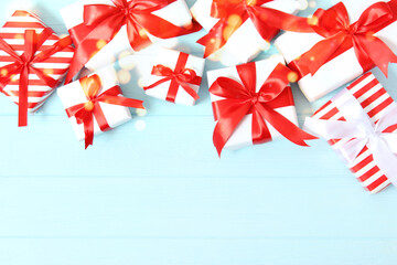 Beautiful background Christmas or New Year with a place for text on a colored background with bokeh of lights and snow