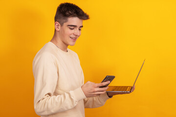 young teenager or student with laptop and mobile phone