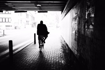 Fototapeta na wymiar silhouette of a person on the street