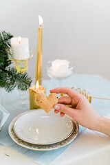 Top view of tablescape wth decoration and love heart cookie. Valentines or Christmas holiday