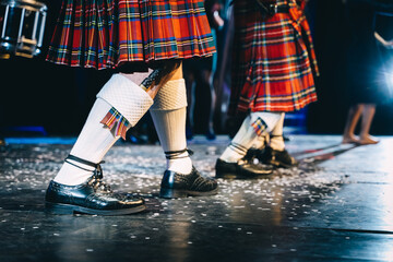 feet of scottish dancers on stage