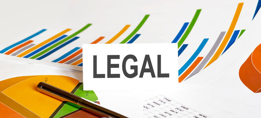 LEGAL text on paper on chart background with pen
