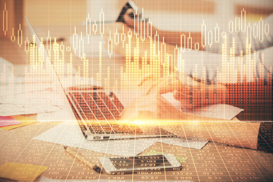 Multi exposure of woman hands typing on computer and financial chart hologram drawing. Stock market analysis concept. © peshkova