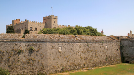 Rhodes fortifications, fortress wall with a carved coat of arms, medieval fortress, the old town of Rhodes, Greece
