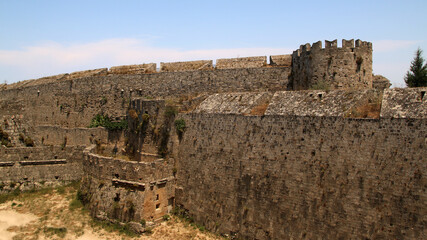 Rhodes fortifications, fortress wall with a carved coat of arms, medieval fortress, the old town of Rhodes, Greece