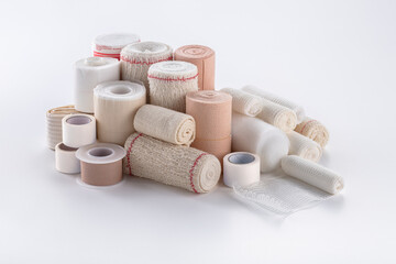 Fototapeta na wymiar variety of bandages, gauze, cotton and Scotch tap on white background.