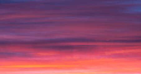 Fototapeta premium Backgrounds and textures. Beautiful and dramatic colorful sky with clouds at sunset. Sky texture. Abstract nature background.