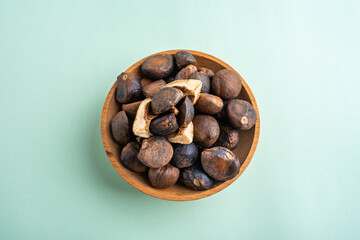 A dish of dried camellia seeds