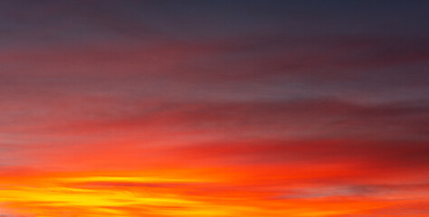 Backgrounds and textures. Beautiful and dramatic colorful sky with clouds at sunset. Sky texture. Abstract nature background.