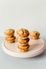 Chocolate banana muffins on a round pink dish