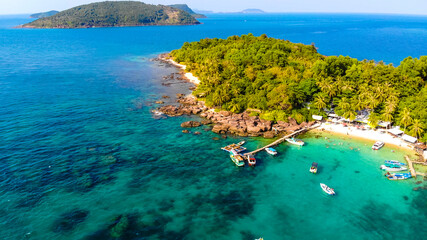 Aerial view of beautiful landscape, tourism boats, and people swimming on the sea and beach on May...