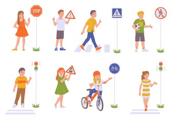 Fototapeta na wymiar Set of kids with road signs and traffic light flat vector illustration isolated.