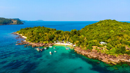 Aerial view of beautiful landscape, tourism boats, and people swimming on the sea and beach on May...