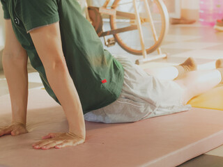 Naklejka premium Stretching after yoga exercise.