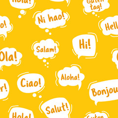Pattern with Speech Bubble. Hello, in different languages of the world. Hand drawn doodle talking bubbles. Bright yellow Seamless pattern. Vector illustration doodle style. © kornetka