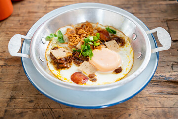 Pan Fried Egg topping with Thai sausage