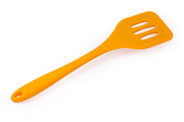 Plastic bendable kitchen spatula on a white background