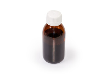 Brown plastic bottle of liquid medicine on a white background
