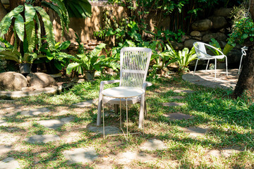 white chair in the garden