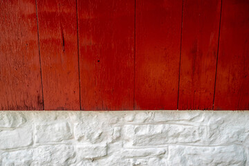 Beauitiful colonial Pennsylvania architecture with a new coat of paint. Very clean and bright. Vertical wood siding over whitewashed stone base, rough and smooth textures and beautiful lines.