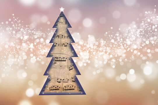 Sapin de No&euml;l avec un parchemin de partition musicale