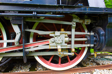 Old steam locomotive preserved and on display in a public park in Como on Lake Como.