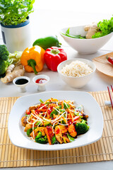 sweet and sour chicken with rice and vegetables