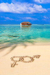 Sex symbols on beach