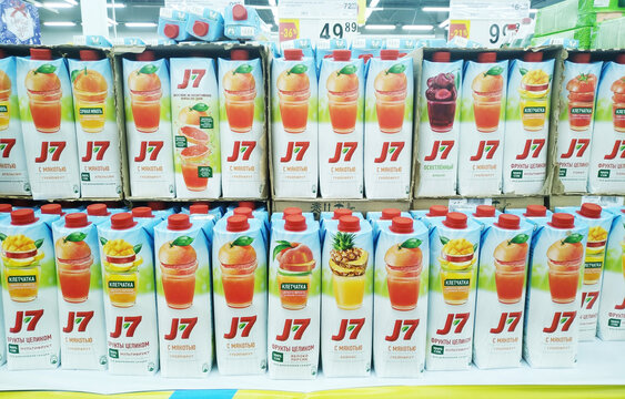 KEMEROVO, RUSSIA, NOVEMBER 12, 2020. Many packs of various juice J7 are sold in the food store