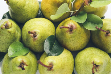 Fresh ripe pears as background