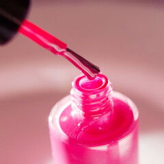 Pink nail polish. Natural hard light, deep shadows. The concept of fashion and beauty industry. - Image